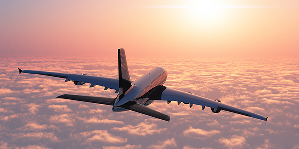 Airplane at sunset